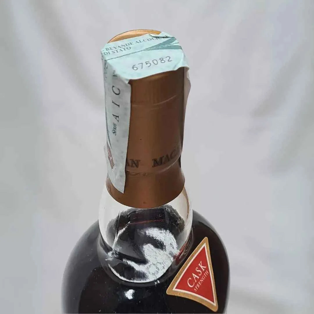 Bottiglia di scotch whisky ​Macallan 10 years old Cask Strength 58,4% 1L | Single Malt | Sherry Wood Cask - Timeless Whisky